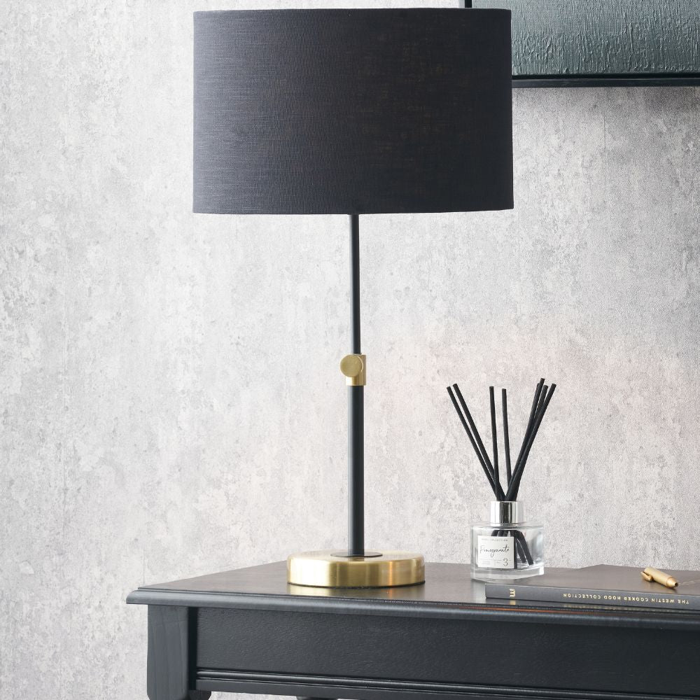 Bryce Black and Gold Metal Rise and Fall Table Lamp