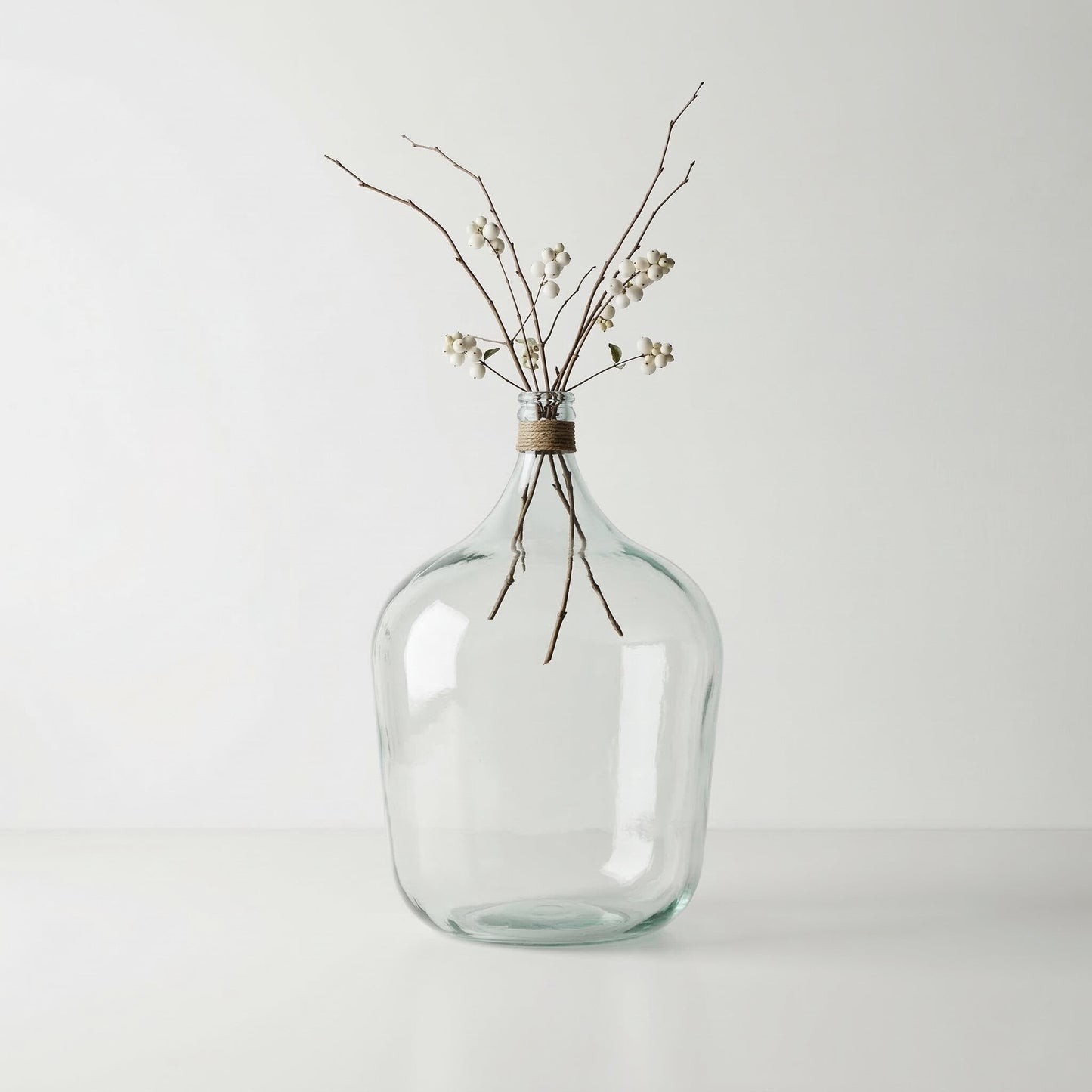 Clear Recycled Large Bottle Vase With A Raffia Wrapped Neck