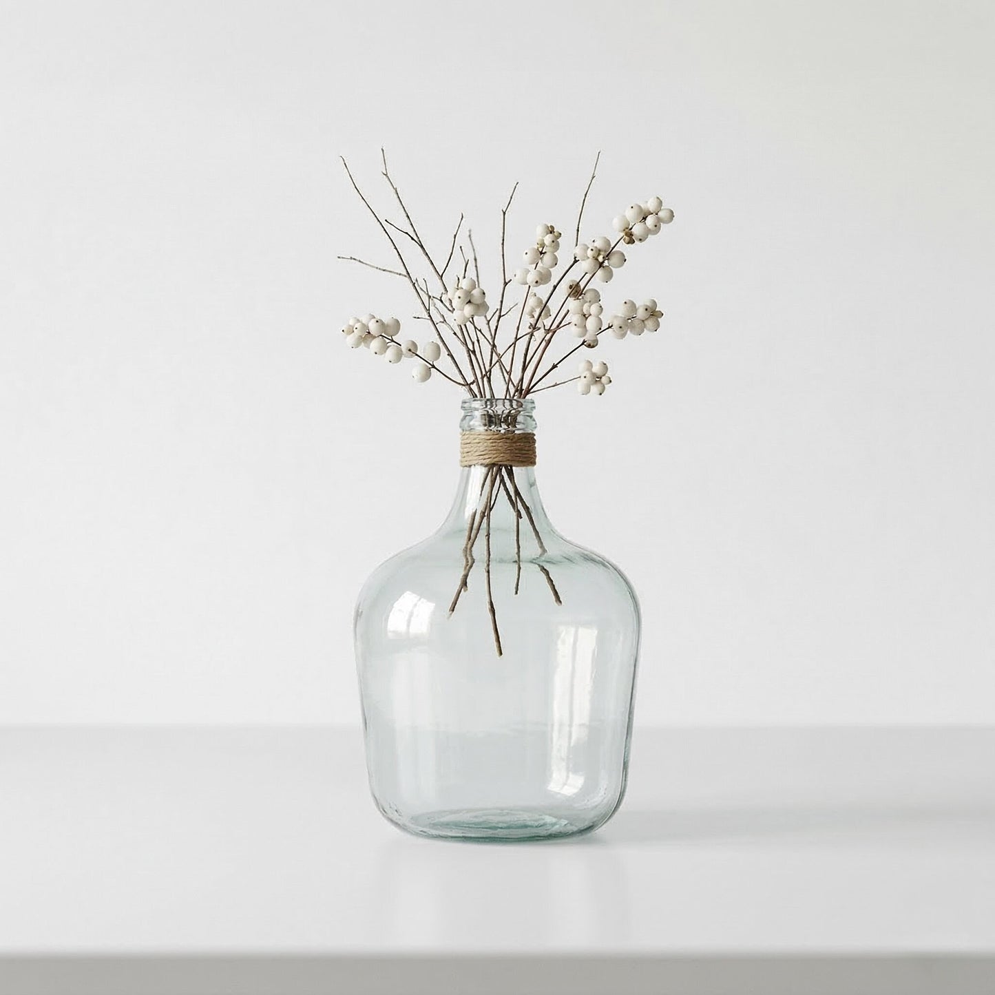 Clear Recycled Medium Bottle Vase With A Raffia Wrapped Neck