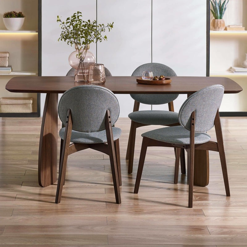 Dining table set with chairs in a modern interior setting